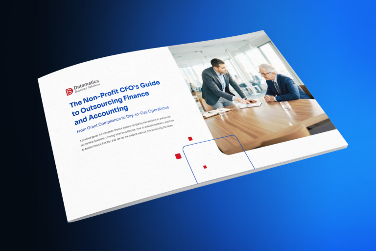 Cover of Datamatics brochure: 'The Non-Profit CFO's Guide to Outsourcing Finance and Accounting' with two professionals in a meeting room.